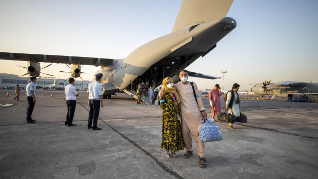 Evacuees from Kabul arrive at Tashkent Airport in Uzbekistan. One of three German military planes evacuated some 131 people from Kabul.