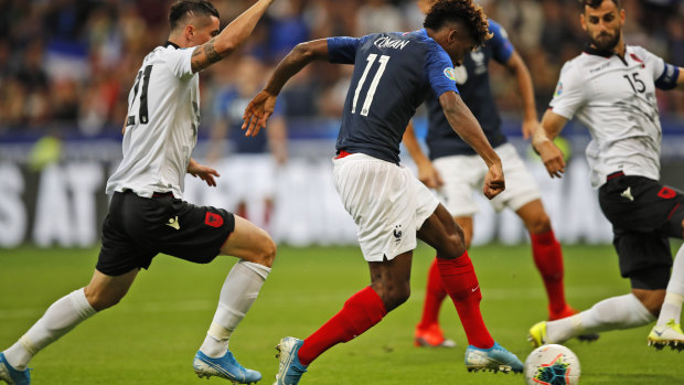 France's Kingsley Coman scores the opening goal during the Euro 2020 group H qualifying match between France and Albania at the Stade de France.