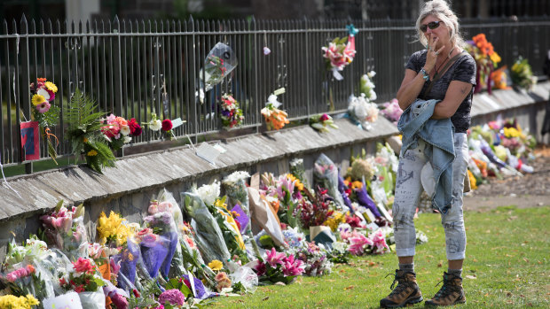 Floral tributes on the fence of the Christchurch Botanic Gardens on Saturday.