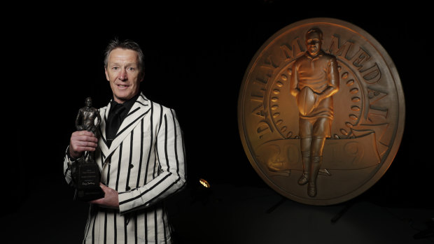 Craig Bellamy accepts the Dally M coach of the year award last October.
