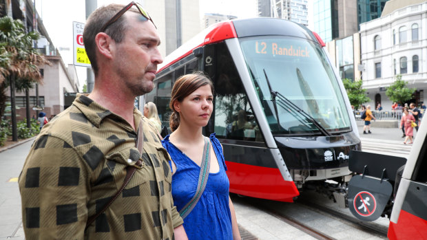 Glebe residents Tim and Franzi Mueller enjoyed their first trip on the light rail line but say it was 'just a little slow'. 