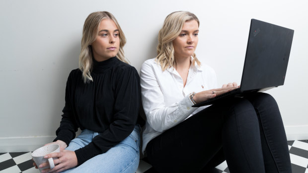 Lucy Foley (left) is on JobKeeper, while flatmate Annabel Ellis has remained in full employment.