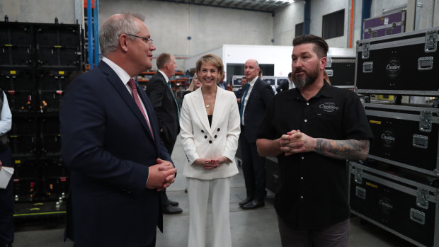 Prime Minister Scott Morrison talks to Creative Productions owner Dave Jackson in July. 