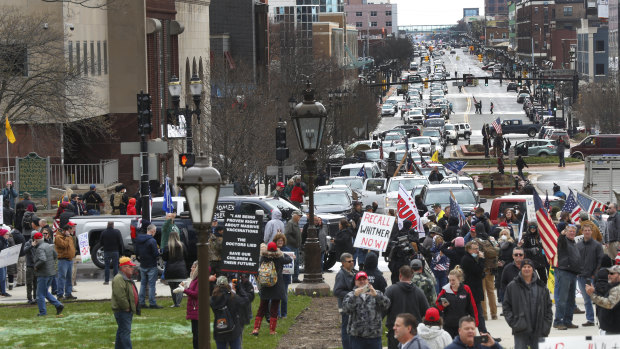 Sick and tired: protesters gather at the Michigan State Capitol in Lansing, Michigan.
