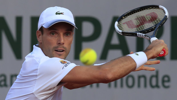Spain's Roberto Bautista Agut plays a shot against Spain's Pablo Carreno Busta in the third round match of the 2020 French Open.