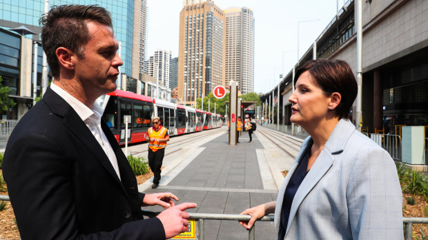 Labor leader Jodi McKay and the party's now transport spokesman Chris Minns speak in December.