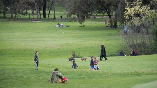 Locals using Northcote golf course as a park.