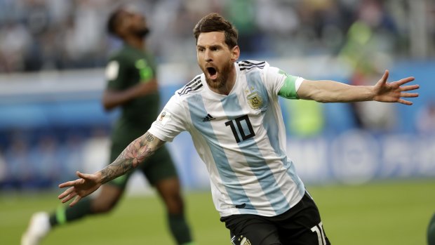Danger man: Lionel Messi scores for Argentina against Nigeria.
