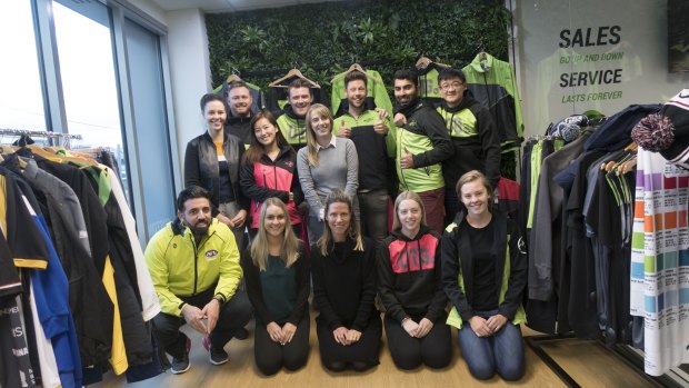 ONTHEGO chief executive Mick Spencer (back row, second from left) with his Canberra team at their Mitchell head office on Wednesday. Michael Caggiano, Wouter Spruijtenburg, Gabe Spencer, Jade Richards, Ellie McLennan, Izi Tanewski, Muhammad Junaid, Jieming Hu, Sarah McGill, Rachael Moon, Ming Sun.