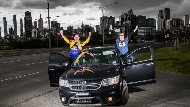 West Coast fans Nige Roberts and Nina Pokucinski made a triumphant arrival in Melbourne on Friday.