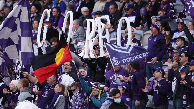Purple patch: Fremantle fans show their colour earlier this year.