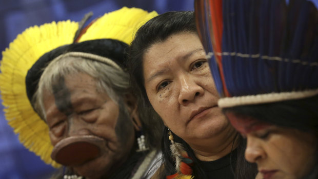 Kayapo tribe leader Raoni Metuktire, from left, Joenia Wapichana, the first Brazilian indigenous MP, and indigenous leader Sonia Guajajara, meet with lawmakers to discuss land rights last week.