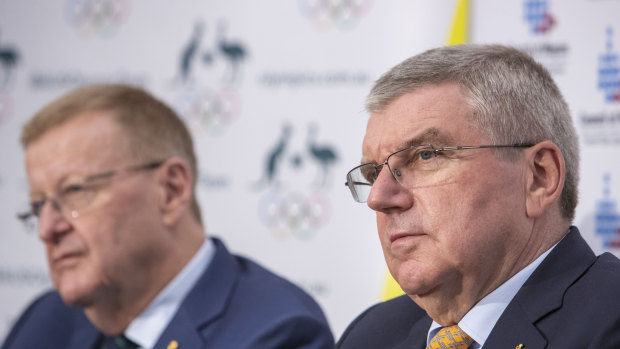 AOC president John Coates (left) and IOC president Thomas Bach. The pair will meet next week in Switzerland to discuss the prospect of a 2032 Games in Queensland.