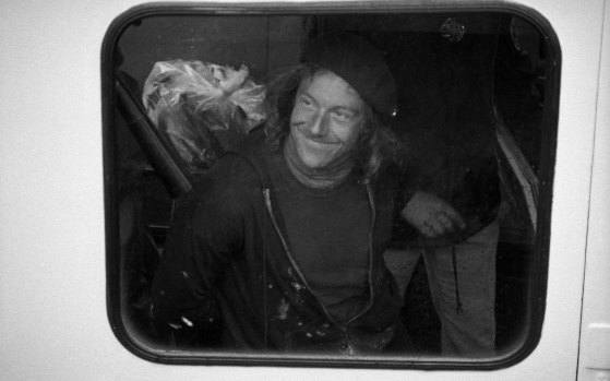 Edwin Drummond smiles while in custody on a New York Police Department boat on May 11, 1980. 