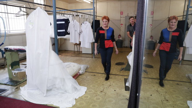 One Nation leader Senator Pauline Hanson visits a drycleaning business in Caboolture on Wednesday.