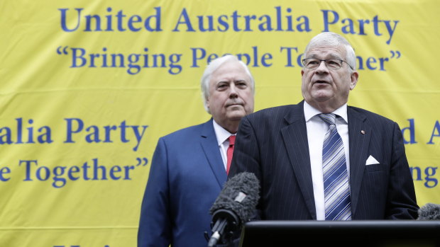 Seantor Brian Burston with Clive Palmer at a press conference on Monday.