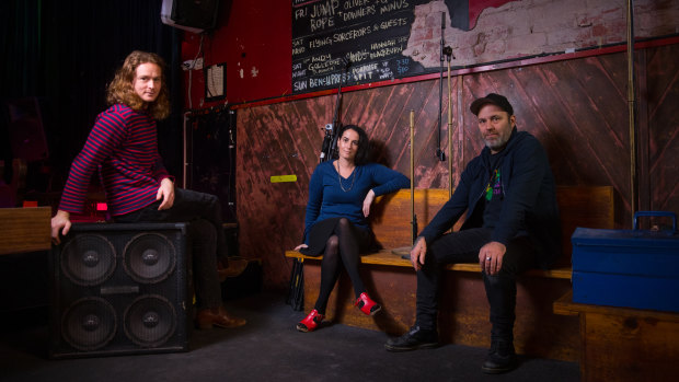 Liam Gough (left) of The Teskey Brothers, Lucie Ribush from Revolver and Liam Matthews, owner of The Old Bar, are sending out an SOS.  