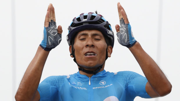 Colombia's Nairo Quintana celebrates as he crosses the finish line to win stage 17.