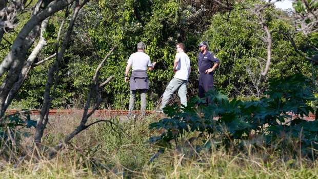 Police, undercover police and sniffer dogs search for missing backpacker Theo Hayez, along the northern railway line, his last known location in Byron Bay.