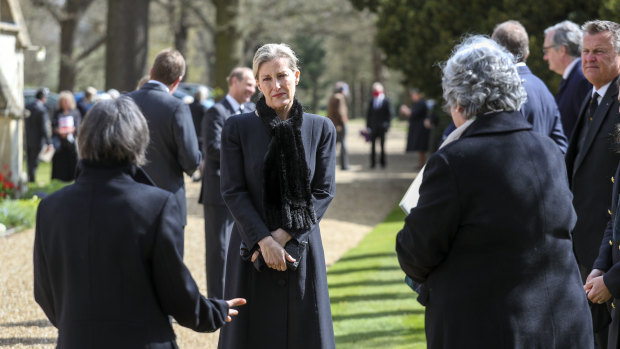 Sophie, Countess of Wessex talks to household staff and mourners at a small church service at Windsor.