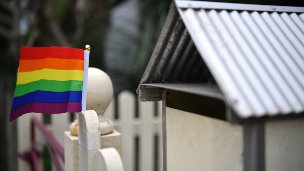 The incident was sparked by a rainbow flag outside the neighbour's home. 