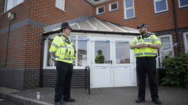 British police officers cordon off the Amesbury Baptist Centre, one of several places the victims are known to have visited before falling ill. 