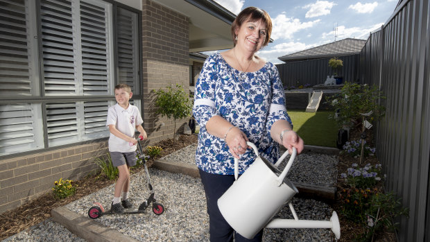 Val Lambert with her grandson Manu Beer at her Googong home. 