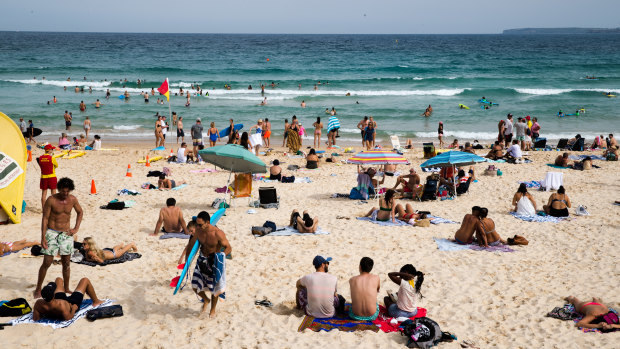People enjoying Bondi on a hot Sunday afternoon in March. It was the sixth-hottest March on record for NSW.