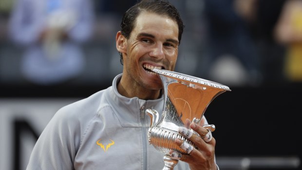Rafael Nadal takes the spoils in Rome.