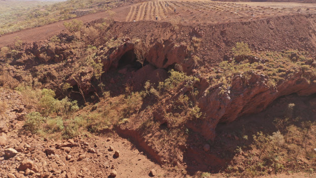 The view on May 15 over the rock shelters, cleared and with charges laid ready for the blast. 