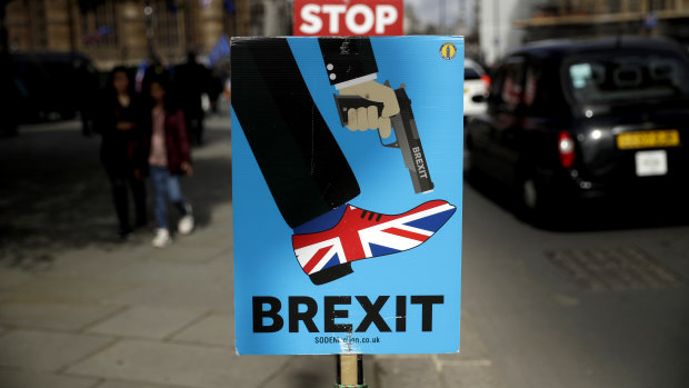 An anti-Brexit placard outside the Houses of Parliament in London.