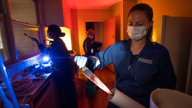 Fingerprint expert Nicole, Sergeant Tracy Starr and biologist Bianca Laan (left to right) at Victoria Police forensic services