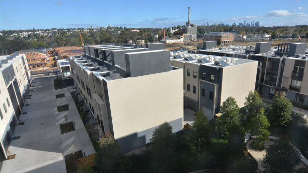 The site is filling rapidly with townhouses and stand-alone dwellings.