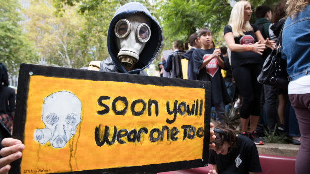 Students brought signs and gave speeches at Sydney Town Hall ahead of the march to Hyde Park.