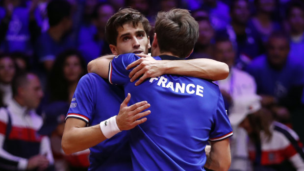 Staying alive: France's Nicolas Mahut (right) and Pierre Hughes ensured the hosts are still in the hunt.
