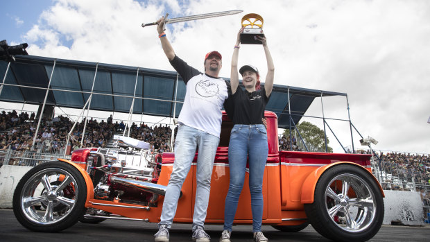 Rick Werner from the Gold Coast celebrates with his daughter Danielle after his 1932 Ford pickup hotrod was named the 2019 Summernats Grand Champion