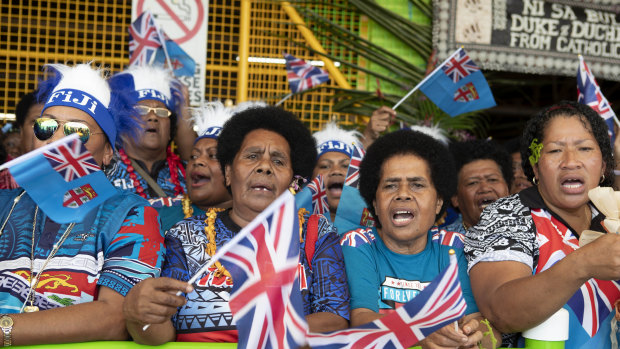 Local Fijian women wait for the arrival of Meghan, Duchess of Sussex at a market in Suva, Fiji.