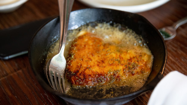 Saganaki cheese with honey and oregano from The Apollo in Kings Cross.
