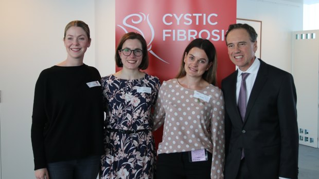 Health Minister Greg Hunt with Anna Knuckey whose sister has cystic fibrosis, Katie Down who has CF and her sister Jessica.