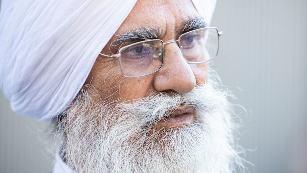 Ramsaroop Sharma, the father of the slain bus driver Manmeet Alisher, outside court.