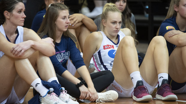 Dejected Adelaide Lightning players after losing the third WNBL grand final to the Canberra Capitals.