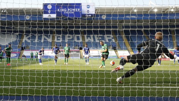 Peter Schmeichel saves a Neal Maupay penalty during the scoreless Premier League draw between Leicester and Brighton.