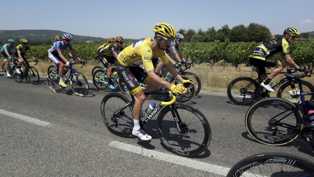 France's Julian Alaphilippe wearing the overall leader's yellow jersey.