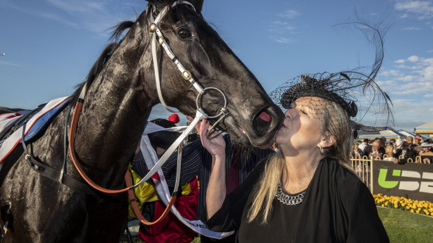 Barrister turned breeder Mary Jane Basson with her "baby", Queensland Derby winner Dark Dream in 2018.
