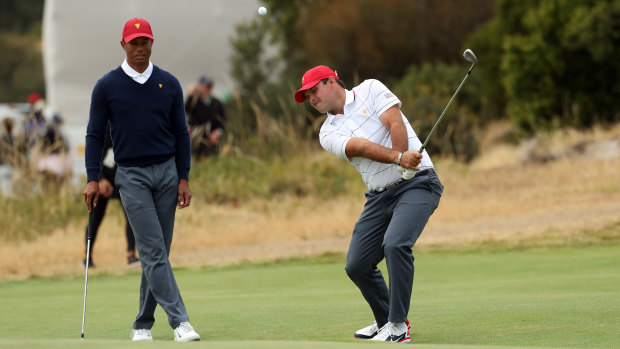 Tiger Woods and Patrick Reed at Royal Melbourne on Tuesday.