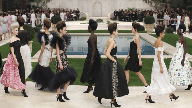 Models wear creations for the Chanel Spring/Summer 2019 Haute Couture fashion collection presented in Paris on Tuesday January 22, 2019.