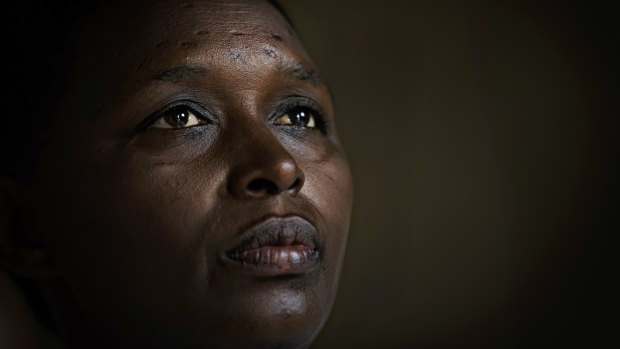Genocide survivor Jannette Mukabyagaju, 42, recounts her experience in her home in the reconciliation village of Mbyo, near Nyamata. Rwanda is commemorating the 25th anniversary of when the country descended into an orgy of violence in which some 800,000 Tutsis and moderate Hutus were massacred over a 100-day period. 