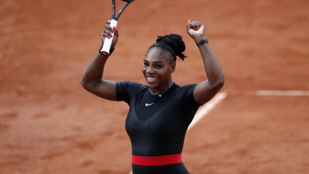 Serena Williams celebrates as she defeats Germany's Julia Georges during their third round match of the French Open. 