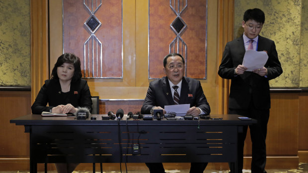 North Korean Foreign Minister Ri Yong-ho, centre, holds a midnight press conference after talks collapsed in Hanoi.