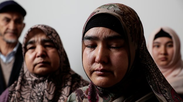 A distressed Mahbuba Alim with friends and family in Adelaide.